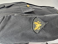 Green Army Jacket with sleeve patch